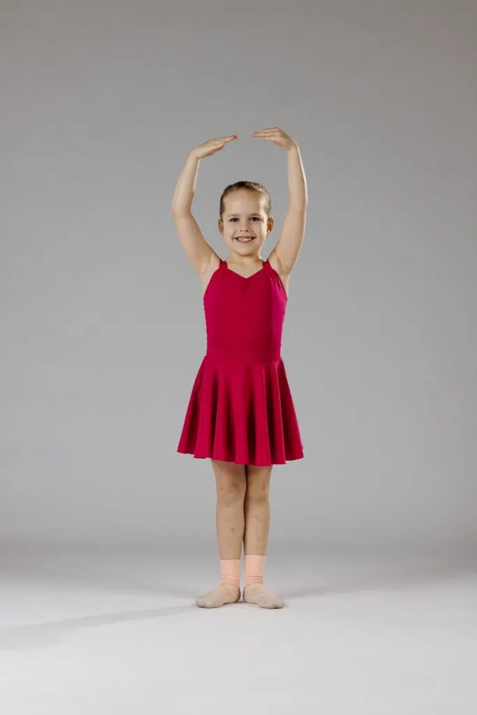 Bayside Ballet First Position Pose in Red Dress Bayside Ballet First Position Pose in Red Dress